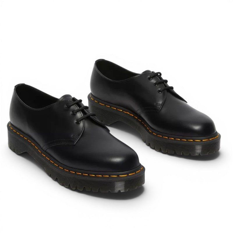 My Store black smooth leather Dr. Martens 1461 Bex platform shoes with yellow stitching and thick soles.